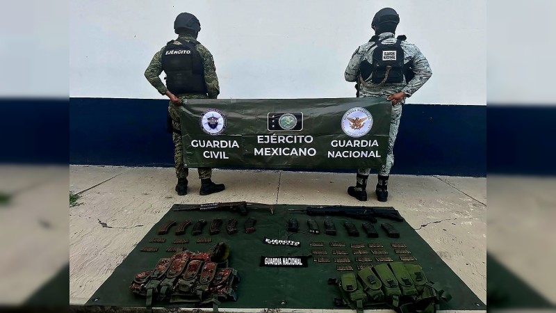 Policías y militares incautan un “monstruo” y armas, en Apatzingán  